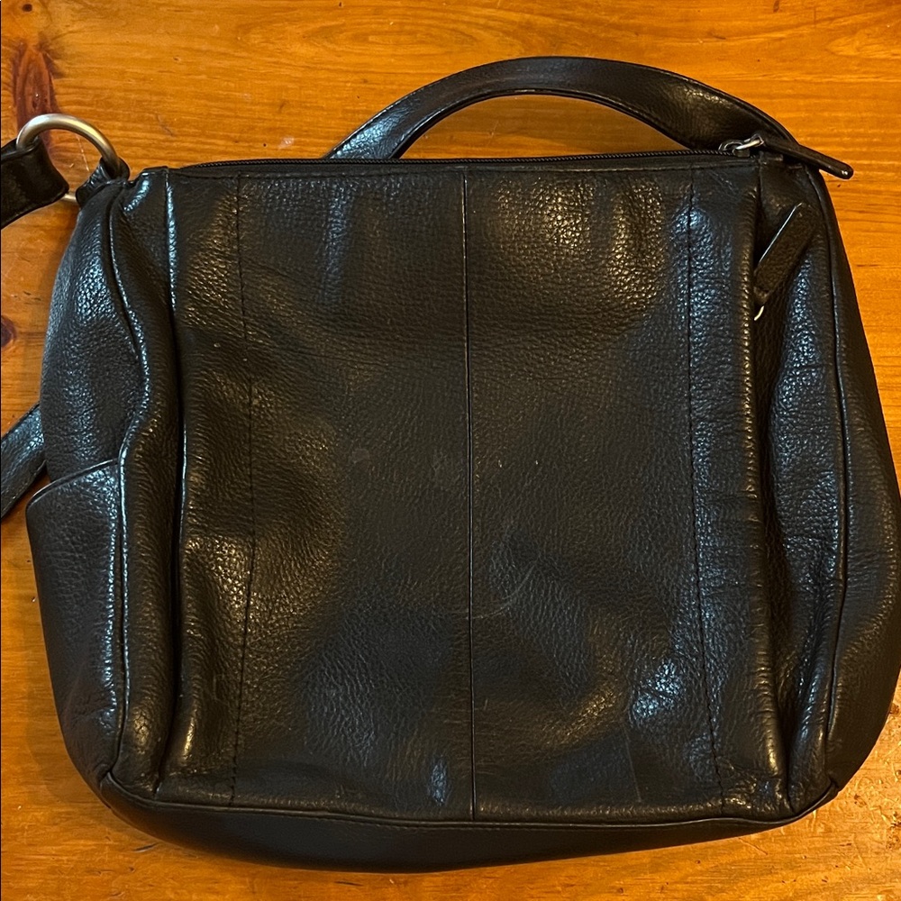 Rolf's black leather purse